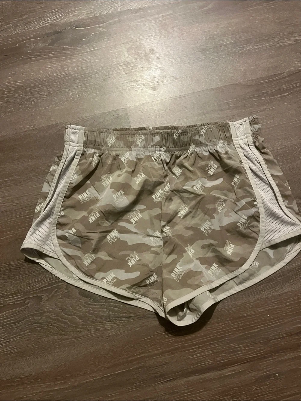 Victoria's Secret PINK camo shorts with repeating 'PINK' text #camouflage #activ